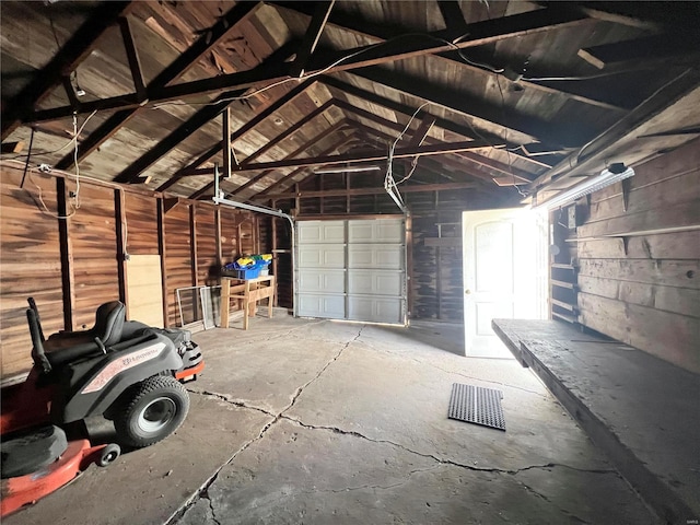 garage with concrete block wall