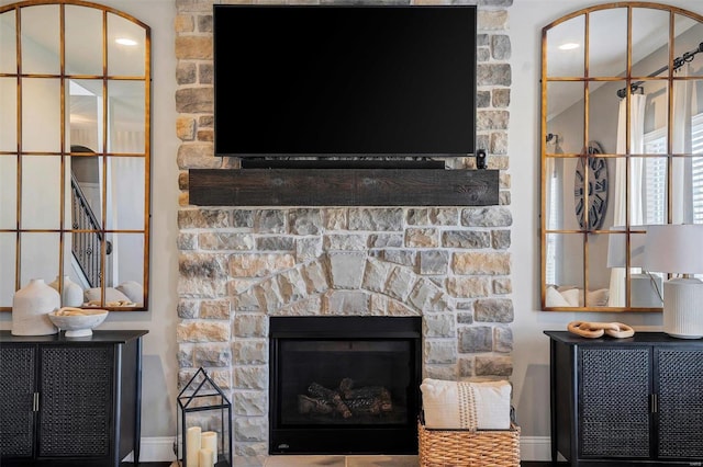 details featuring a stone fireplace