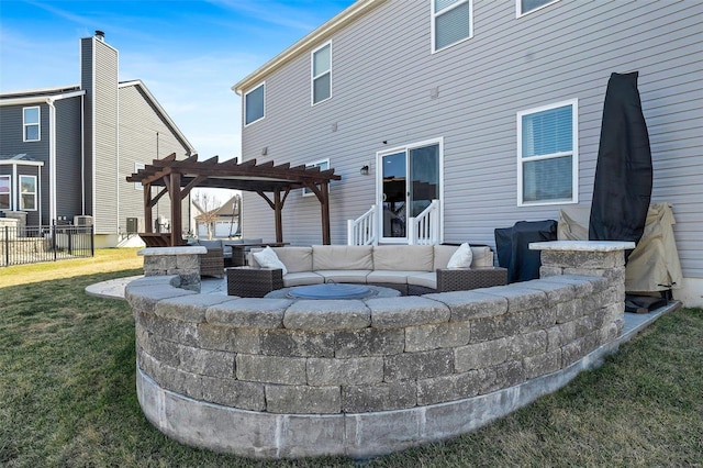 back of property featuring fence, a yard, a pergola, outdoor lounge area, and a patio area