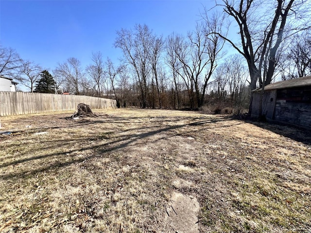 view of yard featuring fence