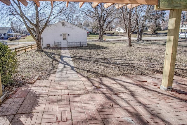 view of patio featuring fence