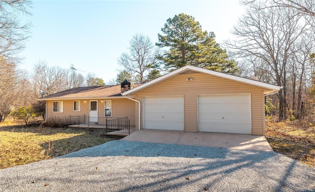 ranch-style house featuring an attached garage