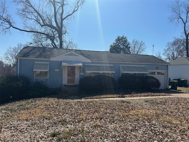 single story home with an attached garage