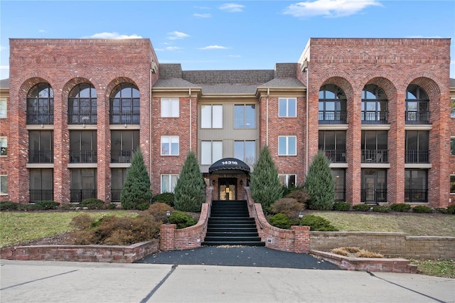 view of building exterior with stairway