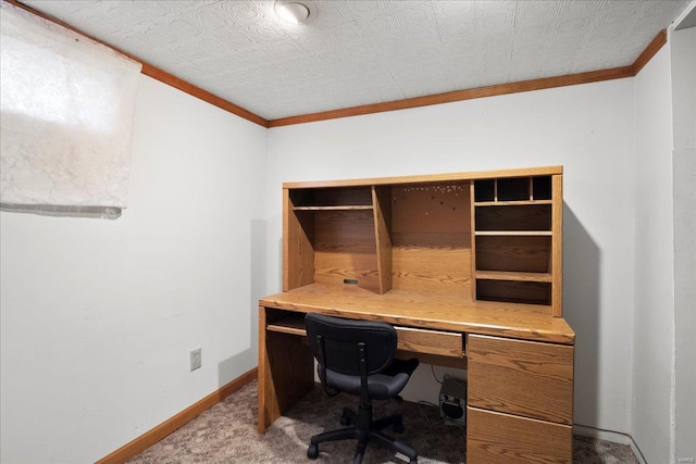 carpeted office space with crown molding and baseboards