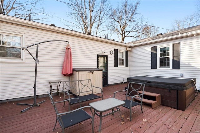 deck with a hot tub