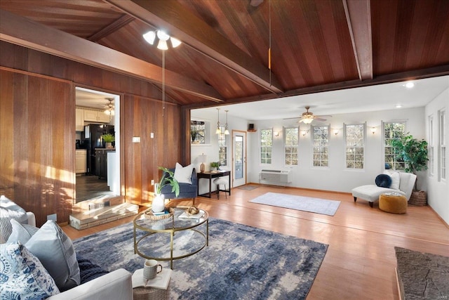 living area with wood ceiling, a wall mounted AC, ceiling fan, and wood-type flooring