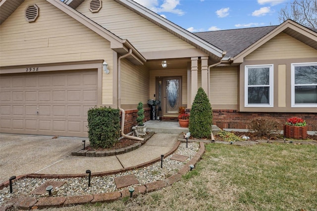 view of front of house featuring brick siding, driveway, a shingled roof, and a garage