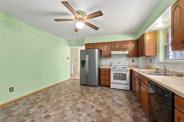kitchen featuring stainless steel refrigerator with ice dispenser, electric stove, under cabinet range hood, a sink, and dishwasher