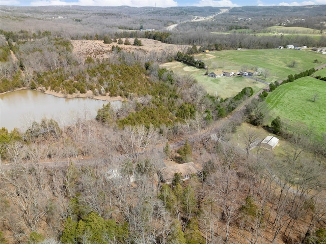 bird's eye view featuring a rural view and a water view