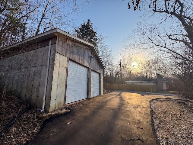 detached garage with fence