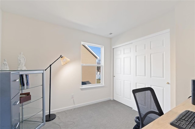 office space with baseboards and carpet