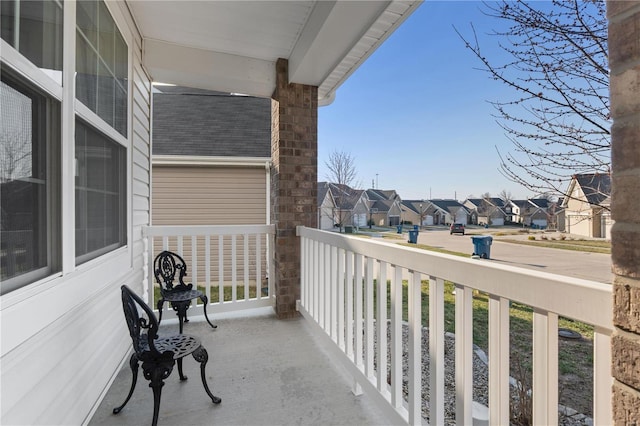 balcony featuring a residential view