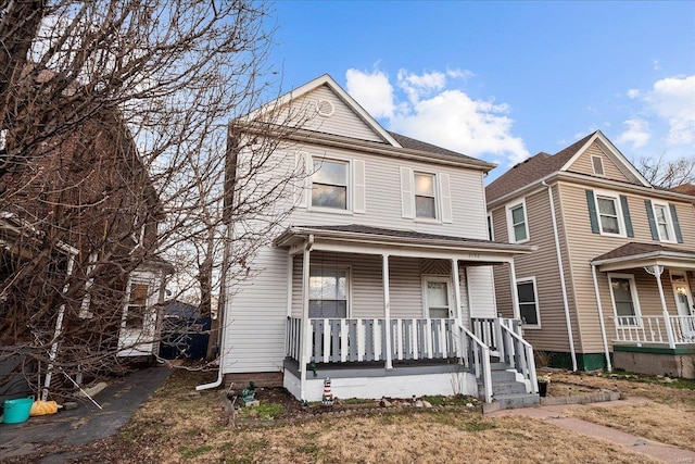 view of front of property featuring covered porch