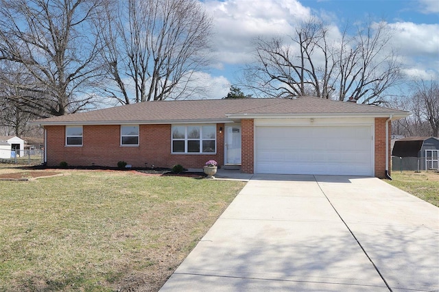 ranch-style home featuring brick siding, a front lawn, and fence