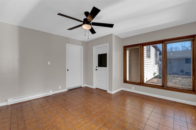 unfurnished room featuring tile patterned floors, a ceiling fan, a baseboard heating unit, and baseboards