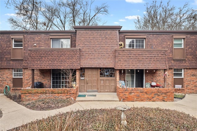 multi unit property featuring brick siding