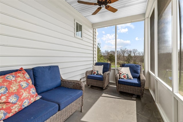 sunroom with a ceiling fan