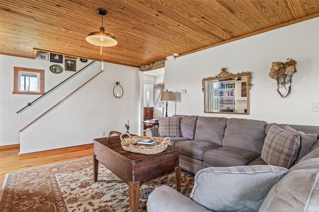 living area with wooden ceiling, stairs, and wood finished floors