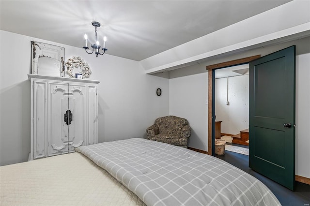 bedroom with a notable chandelier