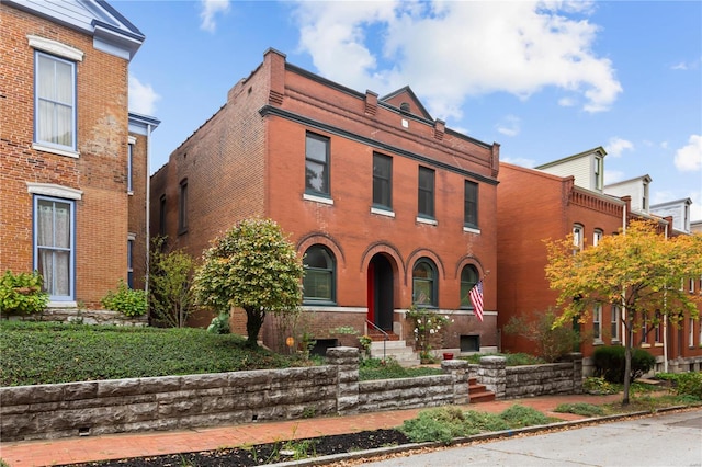 view of front of property featuring brick siding