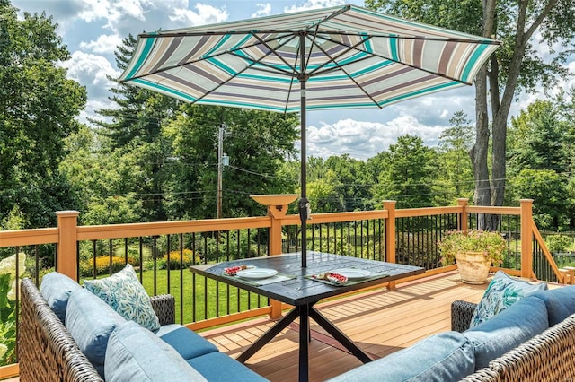 wooden terrace with outdoor lounge area