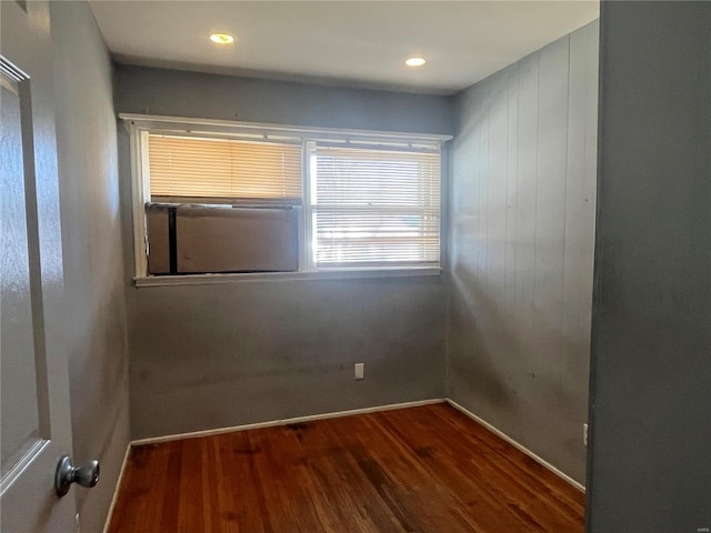 empty room with wood finished floors