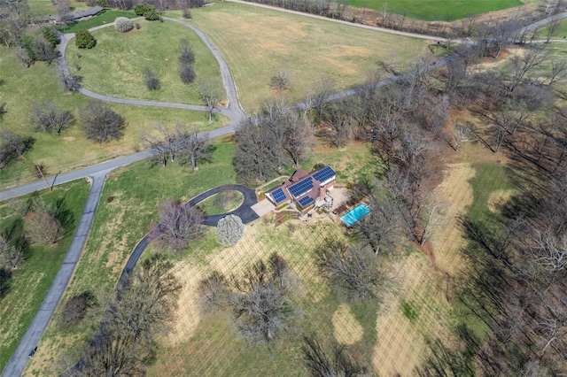 birds eye view of property featuring a rural view