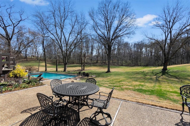 view of patio / terrace featuring an outdoor pool