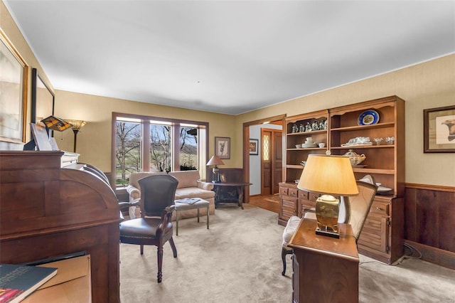 office with light colored carpet and wainscoting