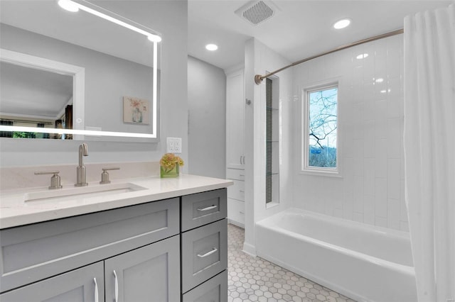 bathroom featuring visible vents, shower / bath combo, recessed lighting, tile patterned floors, and vanity