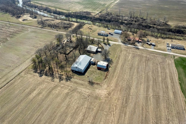 birds eye view of property featuring a rural view