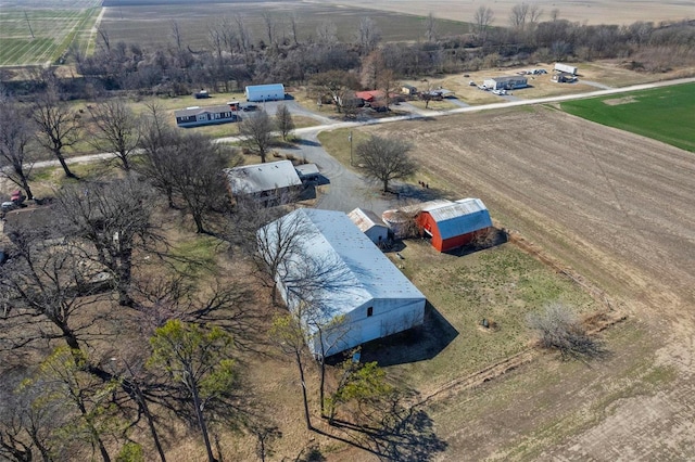 birds eye view of property featuring a rural view