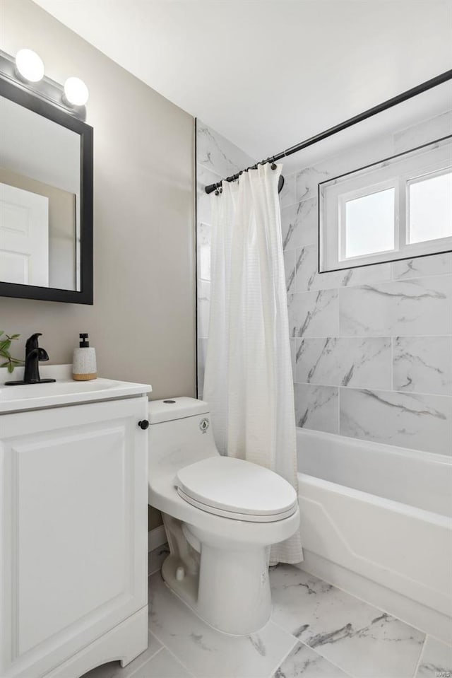 bathroom with marble finish floor, toilet, vanity, and shower / tub combo