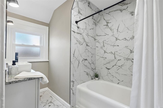 full bath featuring vanity, shower / bath combination with curtain, baseboards, and marble finish floor