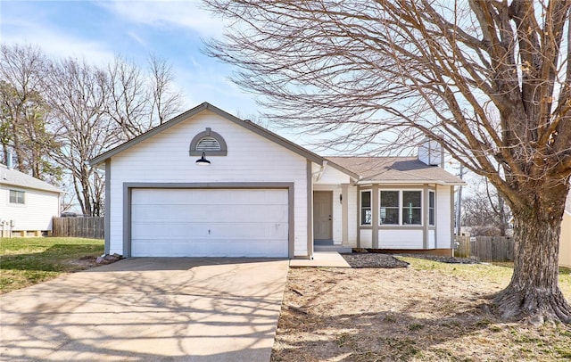 ranch-style house featuring a garage, concrete driveway, and fence