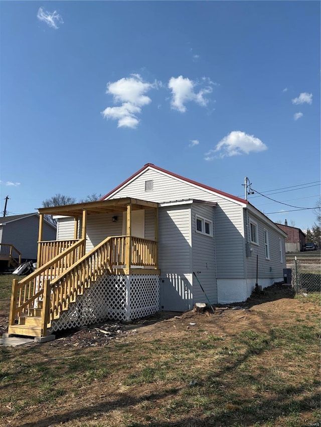 view of front of property with fence