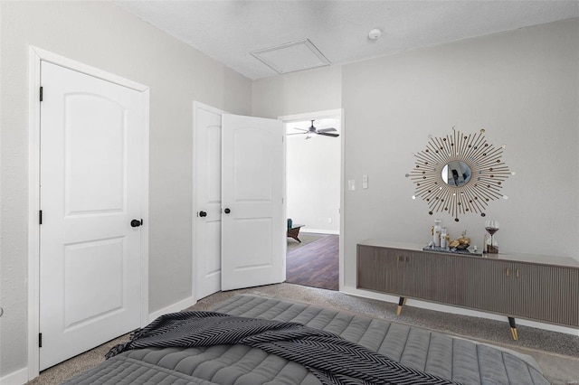 carpeted bedroom featuring baseboards