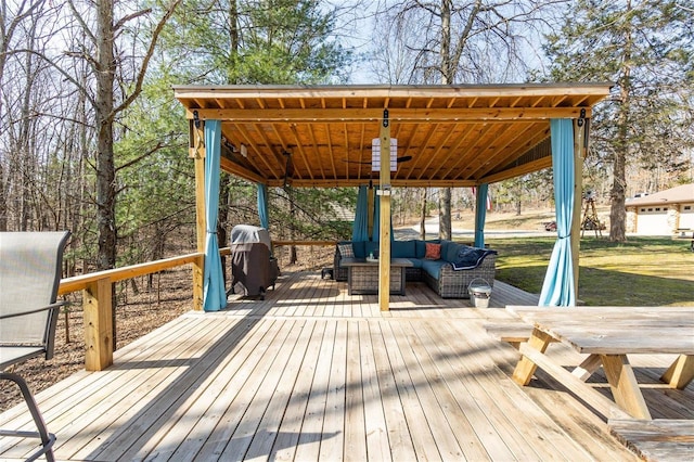 wooden terrace featuring an outdoor living space