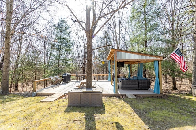 view of yard featuring a gazebo and a wooden deck