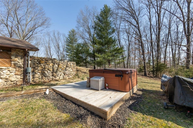 deck with a hot tub