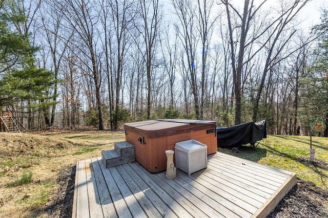 deck with a hot tub