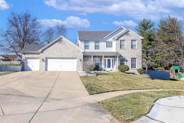 view of front of property with fence, driveway, an attached garage, a front lawn, and a playground