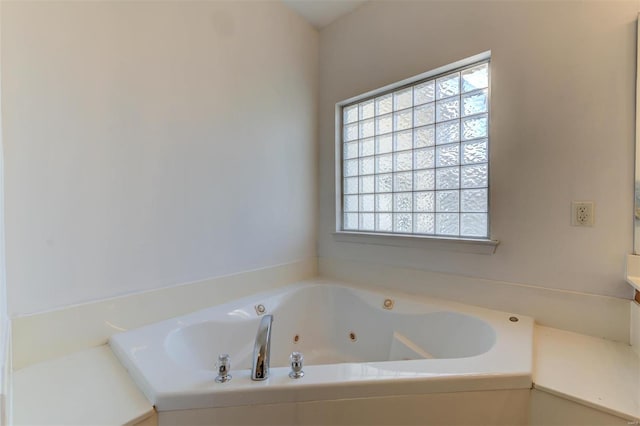 bathroom featuring a jetted tub