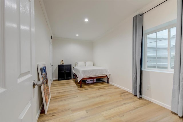 bedroom featuring recessed lighting, baseboards, light wood-style floors, and ornamental molding