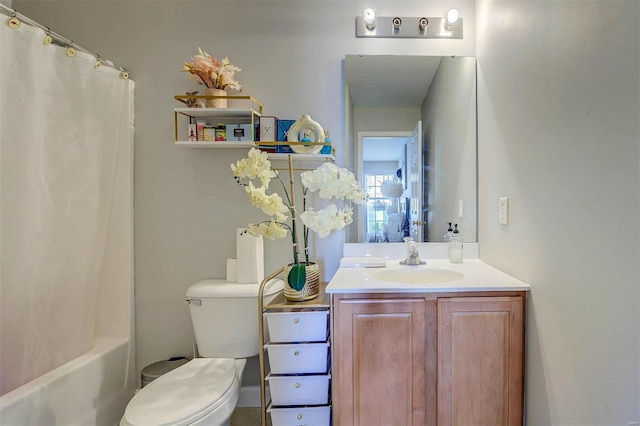 bathroom with shower / bathtub combination with curtain, toilet, and vanity