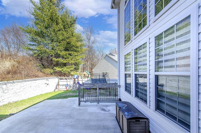 view of patio with fence