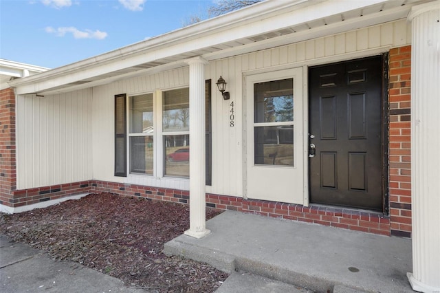 doorway to property featuring a porch