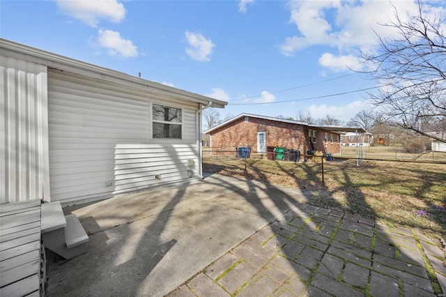 exterior space featuring a patio and fence