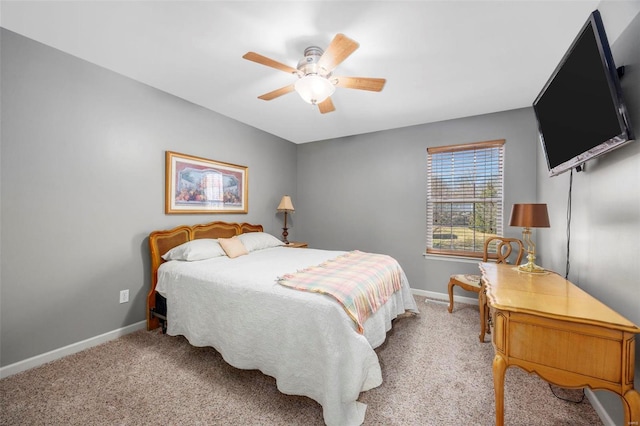 bedroom featuring baseboards, carpet floors, and ceiling fan